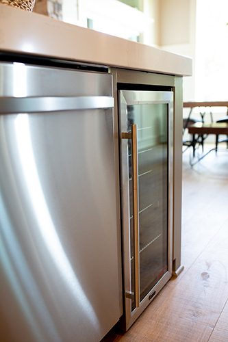 A stainless steel refrigerator and freezer in the kitchen.